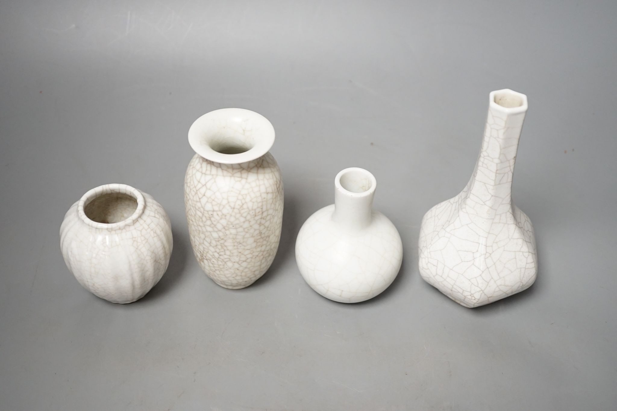 Four Chinese crackle glaze vases, tallest 16 cms high.